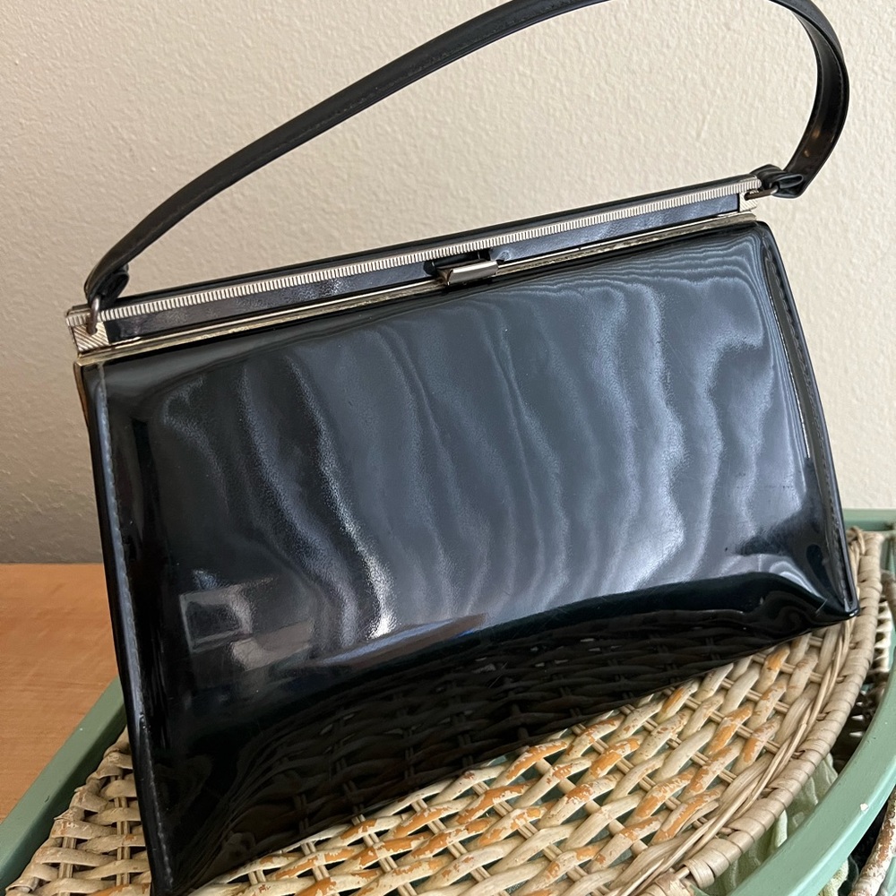 Black vintage patent bag.